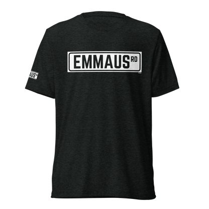 Terse Verse Christian Tee: Emmaus
Charcoal t-shirt with white design/print on chest that reads "Emmaus" as a street sign.
Men's Tee / Unisex
Mockup of front. 