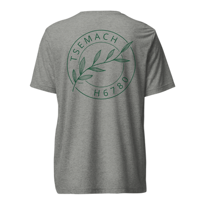 Terse Verse Christian Tee: Tsemach
Athletic grey t-shirt with green design/print on back that reads "Tsemach" and features a branch with leaves along with the Strong's Concordance Hebrew number H6780. 
Men's Tee / Unisex
Mockup of back.